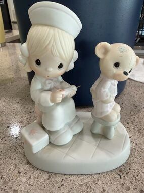 Precious Moments Nurse and Teddy Figurine